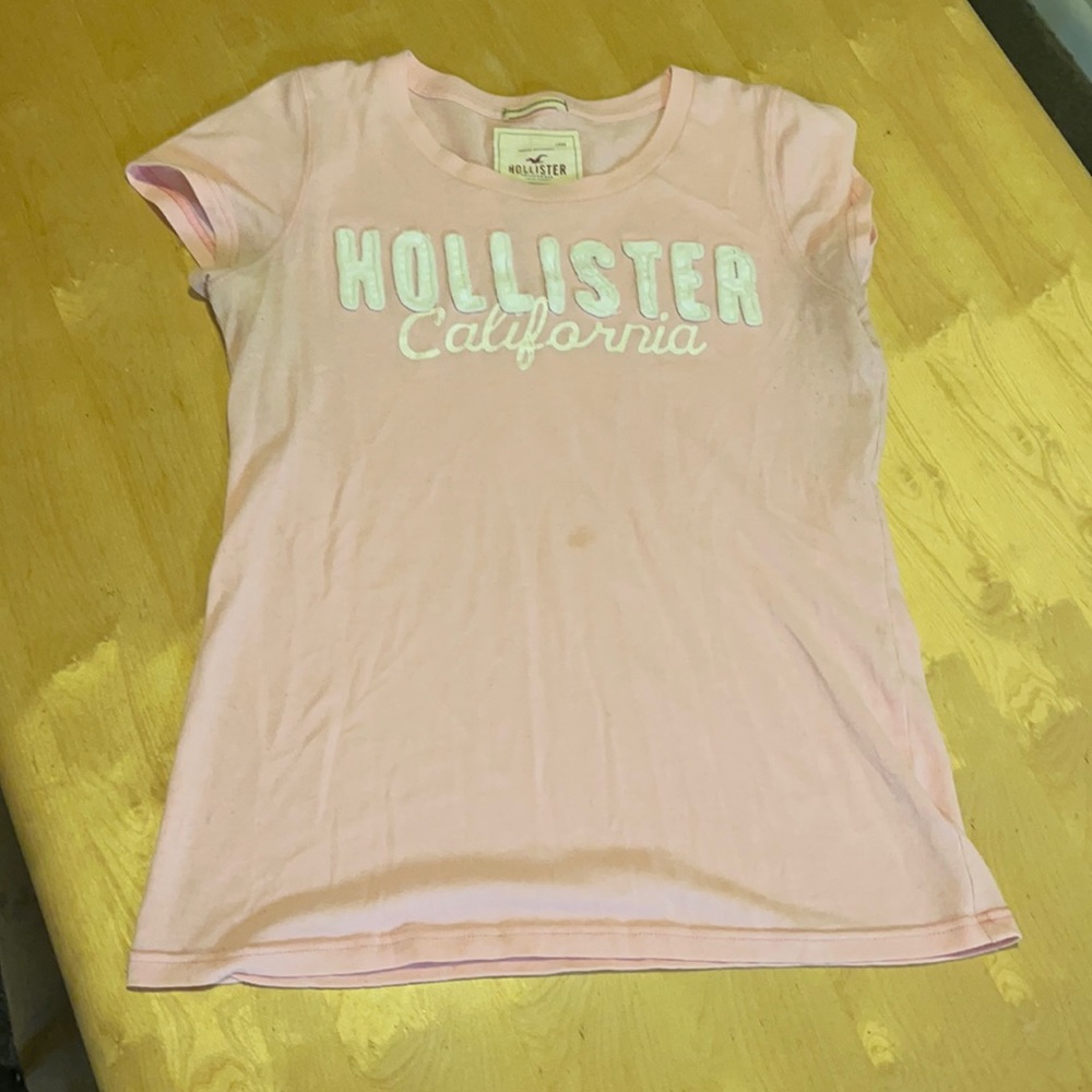 Hollister t-shirt with sewn on letters, small stain on front